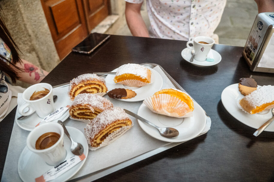 a table with cakes and coffee
